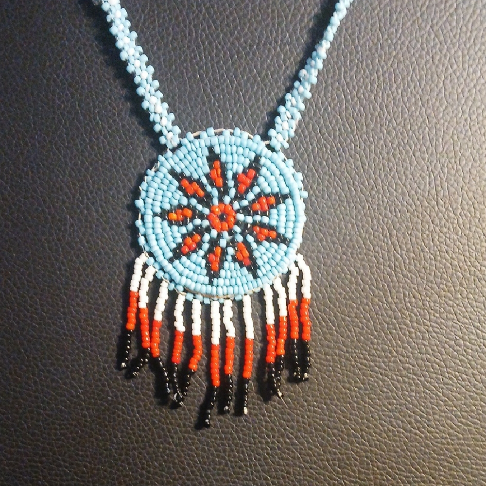 Artisan Beaded Necklace with Blue and Red Design